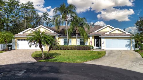 22-702 Staffordshire Ln, SUN CITY CENTER, FL, 33573-7084 | Card Image