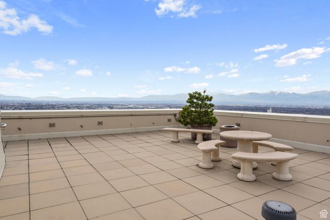 View of patio with a mountain view | Image 38