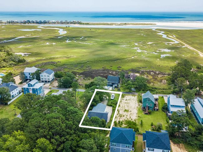 Aerial view of property's location featuring a nearby body of water, a golf club, and property boundaries highlighted | Image 28