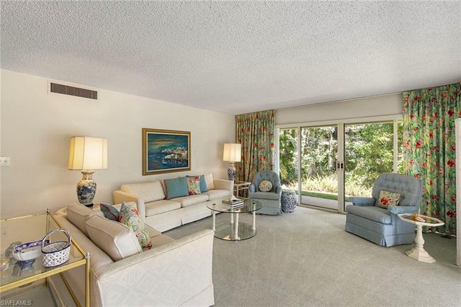 B105 - 105 Wilderness Dr, Condo with 3 bedrooms, 2 bathrooms and 2 parking in NAPLES FL | Image 4