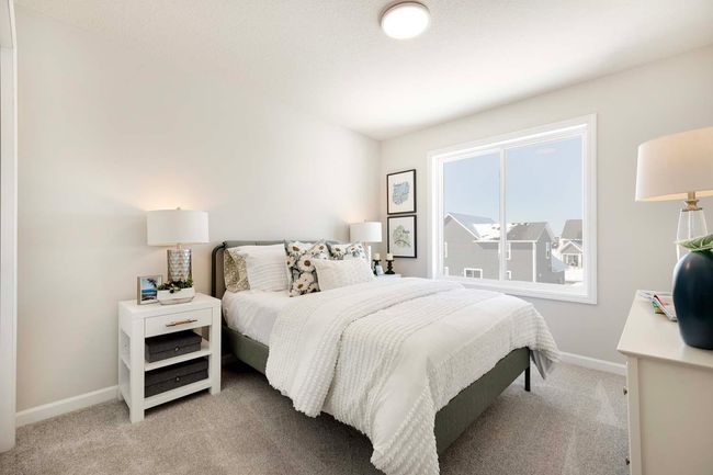 One of three upper level bedrooms (plus bedroom on main floor and lower level bedroom). | Image 17