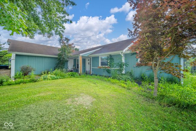 view of front facade featuring a front yard | Image 6