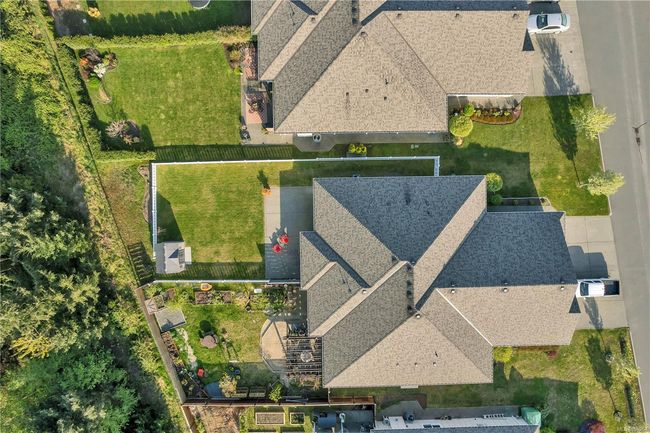 Property extends to the second fence line. They used the space between the white fence and property boundary fence for gardening. | Image 41
