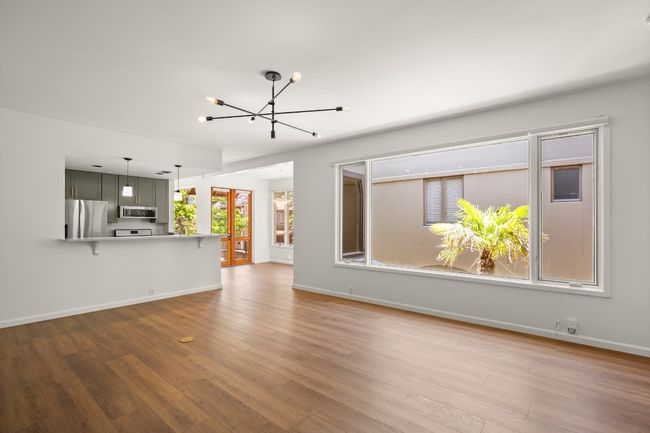 The condo is full of windows, but also completely private, with no neighbors seeing into the home. | Image 8