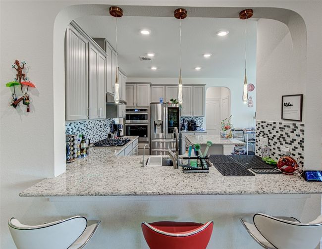 Upgraded Backsplash, Gourmet Kitchen, multiple Outlets | Image 11