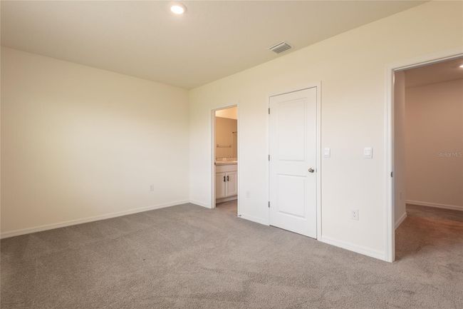 33063 Tulip Petal Ln, Townhouse with 3 bedrooms, 3 bathrooms and null parking in WESLEY CHAPEL FL | Image 33