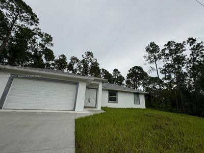 3418 W 51st St, House other with 3 bedrooms, 2 bathrooms and null parking in Lehigh Acres FL | Image 2