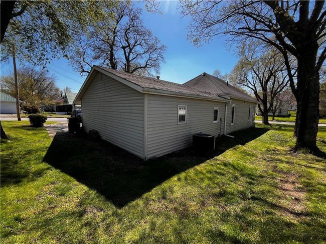 View of side of home featuring a lawn | Image 6