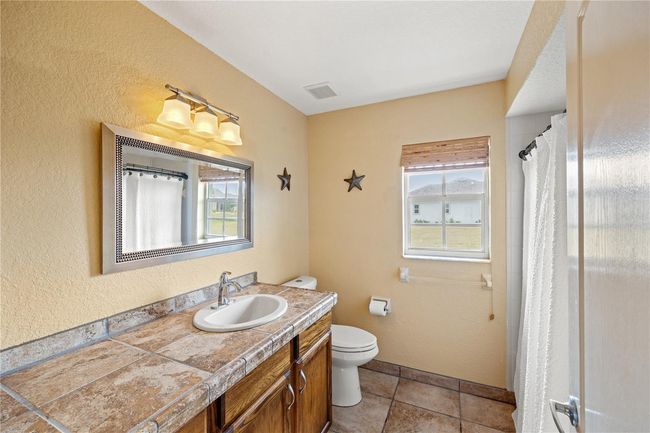 12950 Sw Pembroke Cir S, House other with 3 bedrooms, 2 bathrooms and null parking in LAKE SUZY FL | Image 33