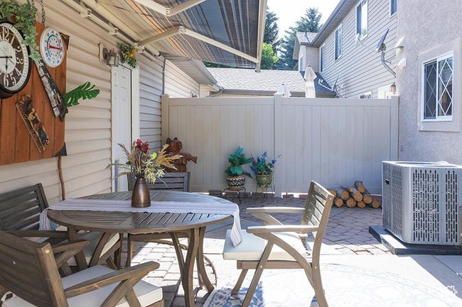 View of patio with outdoor dining space | Image 24