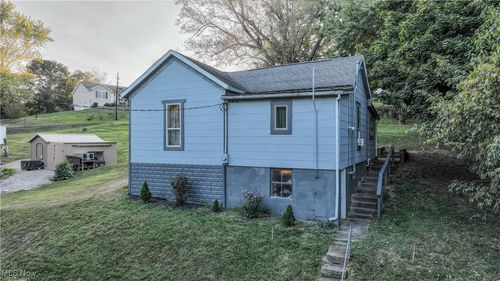 306 Monroe St, Woodsfield, OH, 43793-1052 | Card Image