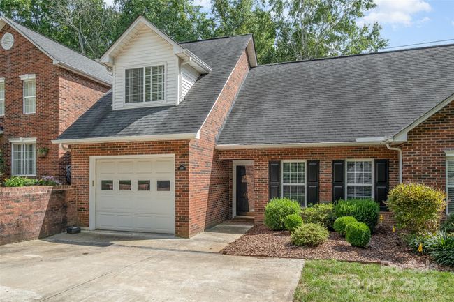 Covered front entrance is protected from the elements! | Image 4