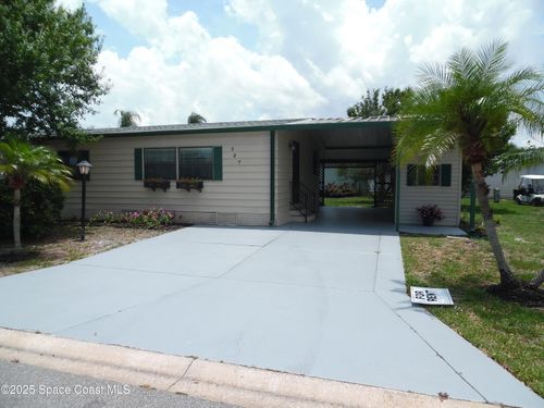 327 Macadamia Dr, Barefoot Bay, FL, 32976-6825 | Card Image