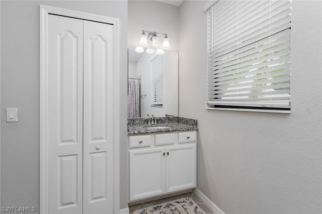Bathroom featuring vanity | Image 14