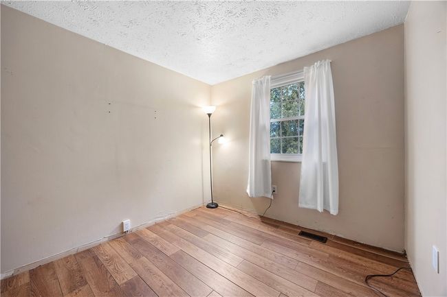 3rd bedroom with tasteful LVP floo | Image 23