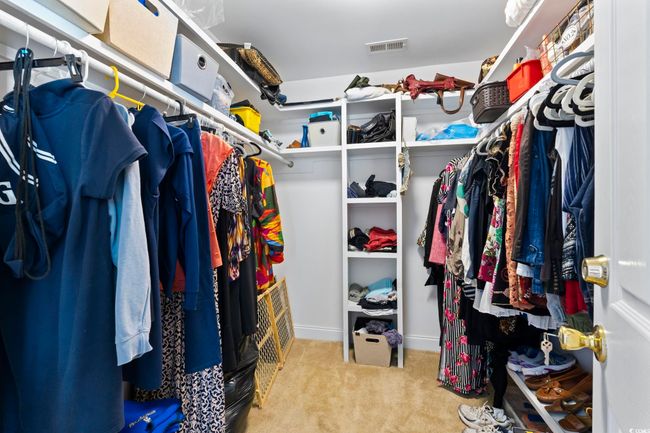 Spacious closet featuring carpet flooring | Image 25