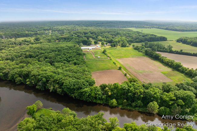 KALAMAZOO RIVER FRONTAGE AT BACK OF PROPERTY | Image 46