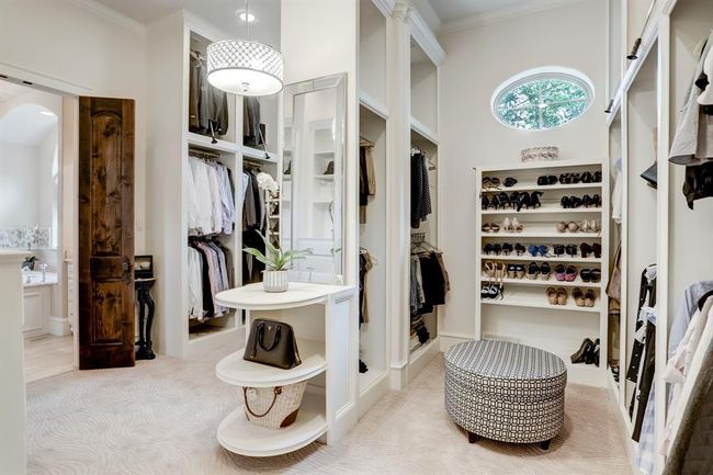 Custom storage in this primary closet. | Image 22
