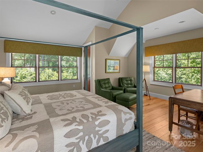 Additional living area above the over-sized two car garage features fourth ensuite bedroom, which offers total privacy or can serve as an executive office. | Image 35