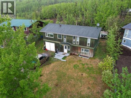 603 Yates Cres, House with 4 bedrooms, 2 bathrooms and null parking in Faro YT | Card Image