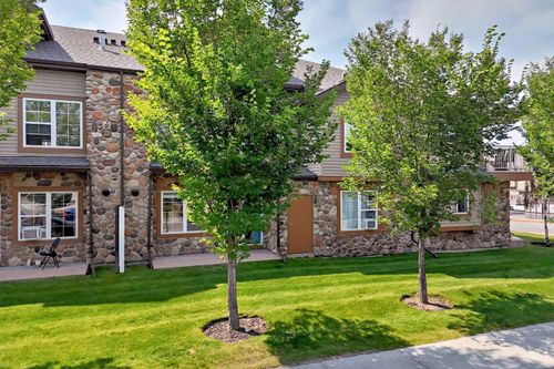 103 - 160 Panatella Landing Nw, Townhouse with 2 bedrooms, 1 bathrooms and 1 parking in Calgary AB | Card Image