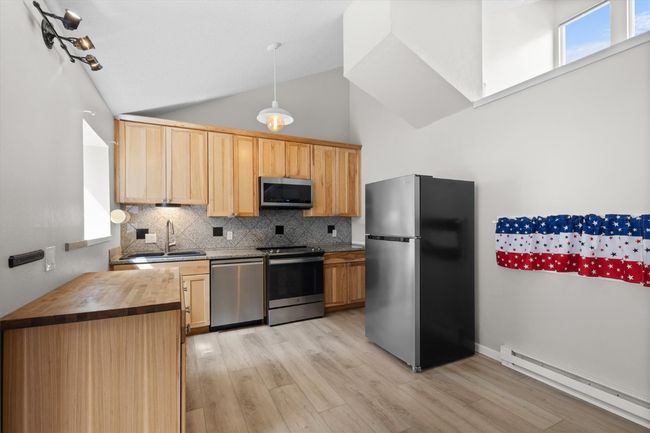 Kitchen and dining room w/built-in shelves for storage | Image 7