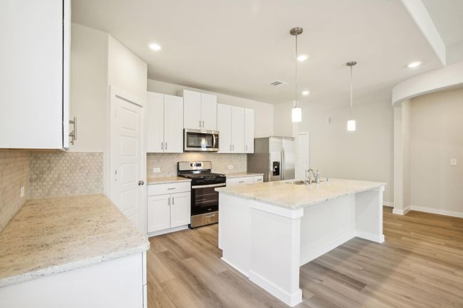 Photo is not of the actual home but is an inspirational photo of builder’s model home and may depict options, furnishings, and/or decorator features that are not included. | Image 6