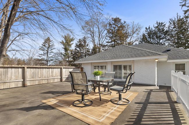 Oversized Rooftop patio! Enjoy relaxing or entertaining, this is truly an extension of living space | Image 12