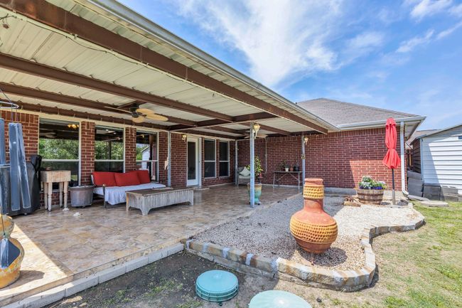 View of patio / terrace featuring an outdoor living space and ceiling fan | Image 34