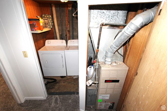Laundry room with separate washer and dryer | Image 31