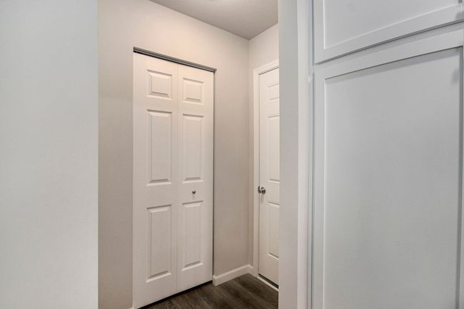 The mudroom includes a storage closet and access to the 2 stall attached garage | Image 18