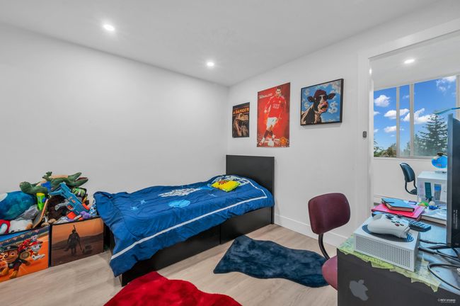 Bedroom featuring baseboards, recessed lighting, and wood finished floors | Image 24