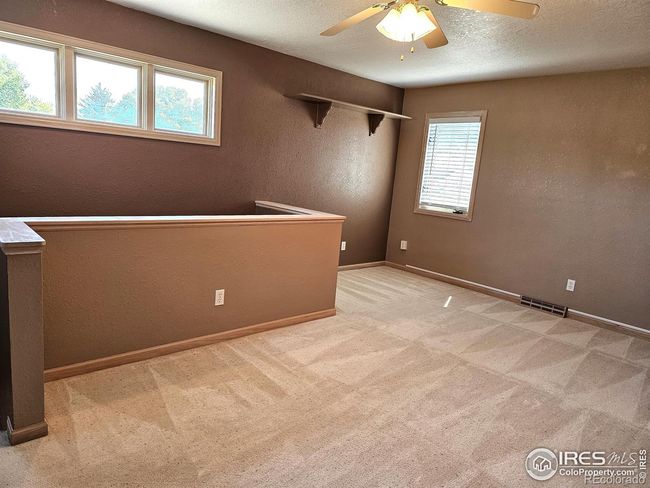 Bonus space could be used as a study, office, guest living room | Image 26