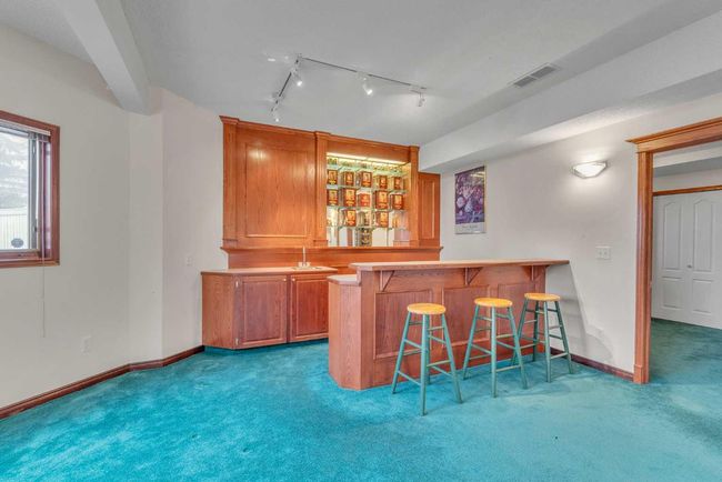 121 Patterson Mount Sw, House other with 5 bedrooms, 4 bathrooms and 4 parking in Calgary AB | Image 35