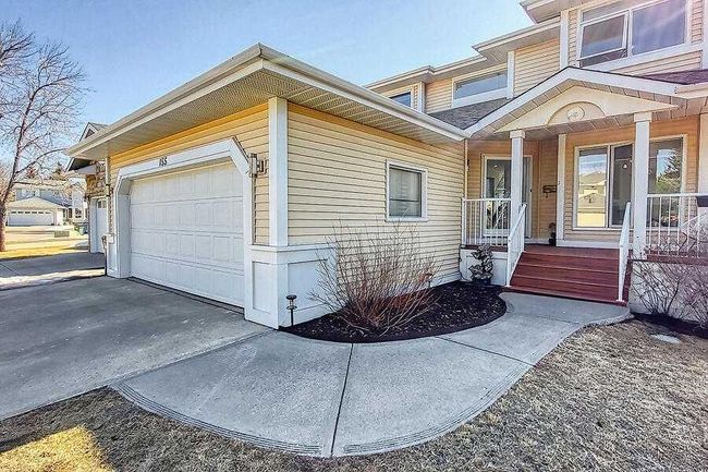 155 Scurfield Place Nw, Home with 4 bedrooms, 3 bathrooms and 4 parking in Calgary AB | Image 2