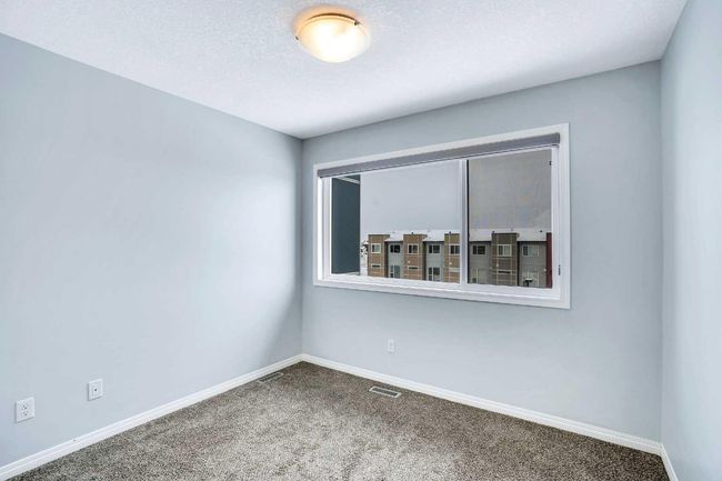 201 - 70 Saddlestone Dr Ne, Townhouse with 2 bedrooms, 3 bathrooms and 1 parking in Calgary AB | Image 20