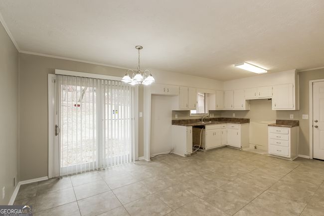 7259 Merlin Way, House other with 4 bedrooms, 3 bathrooms and null parking in Riverdale GA | Image 5