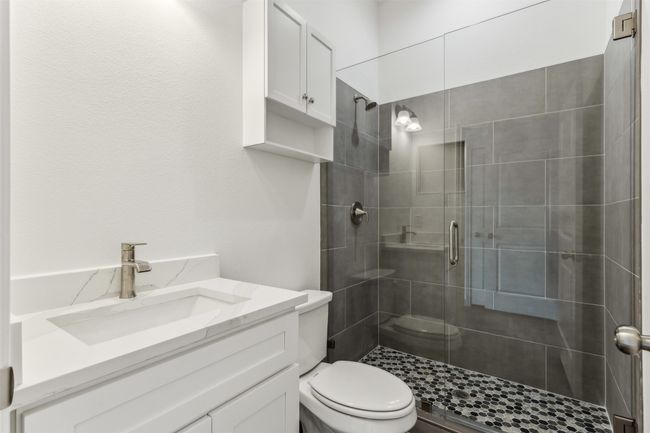 Full bath with a stall shower and vanity | Image 26