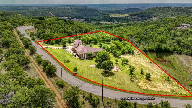 Birds eye view of property featuring a wooded view | Image 40