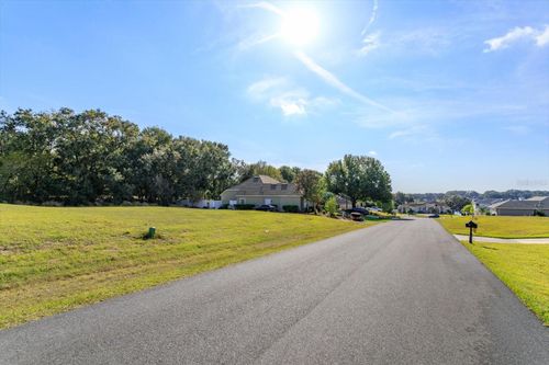 1009 Myrtle Breezes Ct, Fruitland Park, FL, 34731-6547 | Card Image