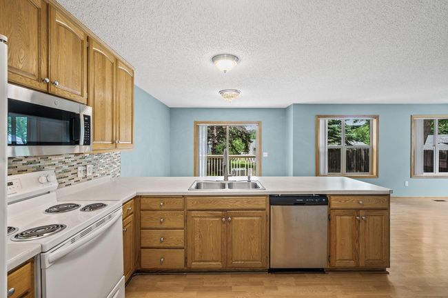 1011 6 Th Ave Ne, Townhouse with 3 bedrooms, 4 bathrooms and null parking in Buffalo MN | Image 5