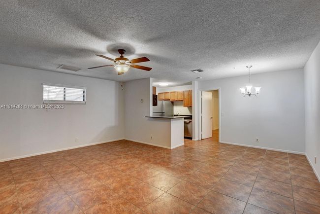 E - 28 Crossings Cir, Condo with 2 bedrooms, 2 bathrooms and null parking in Boynton Beach FL | Image 4