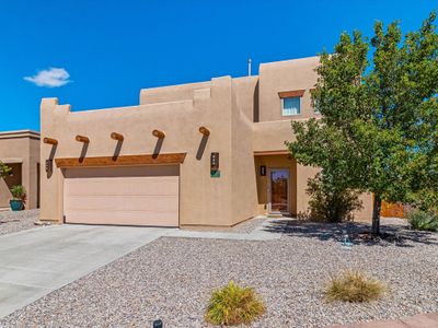 FACADE OF THE HOME WITH MORE PARKING SPACES | Image 1