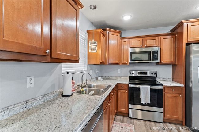 1128 Grassy Meadow Ct, Home with 3 bedrooms, 2 bathrooms and null parking in Scottsburg IN | Image 7