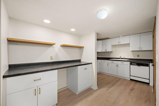 lower level kitchenette with bar option | Image 26