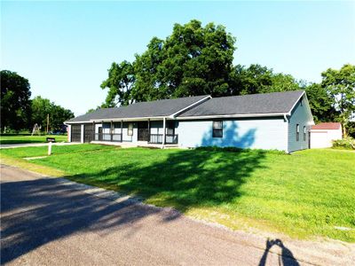 Ranch-style house featuring a front lawn | Image 3