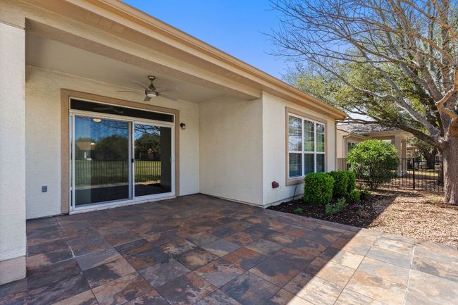 View of patio featuring ceiling fan and fence | Image 33