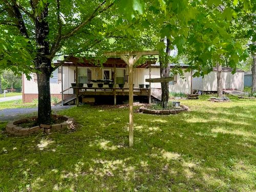 2001 Manitou St, Merriam Woods Village, MO, 65740-9709 | Card Image