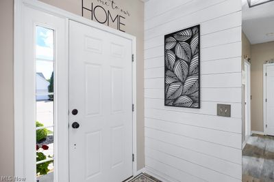 Foyer featuring wood-type flooring and a wealth of natural light | Image 2