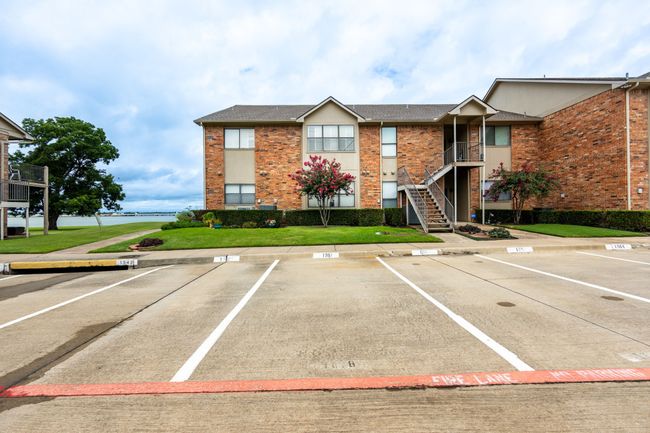 Uncovered parking lot featuring stairs | Image 25